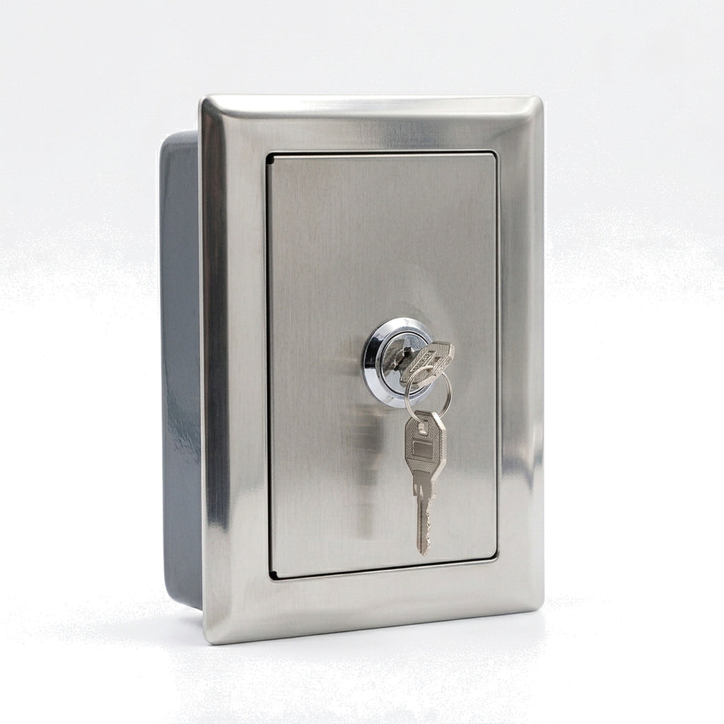 Angled view of the roller shutter push button lock box showing the stainless flange and the depth of the steel body behind it