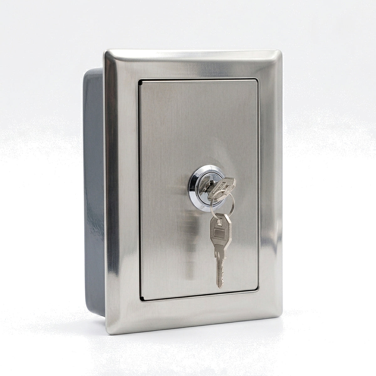 Angled view of the roller shutter push button lock box showing the stainless flange and the depth of the steel body behind it
